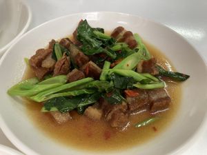 Kale with crispy pork  at Vegan House Pattaya in Pattaya