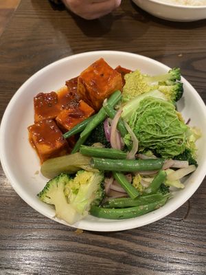 Braised tofu and greens   at Madam Woo  in Queenstown