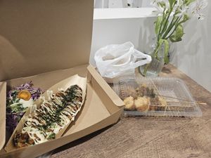 Kushikatsu and takoyaki (restaurant not Oko takoyaki, took food to go.) at OKO Takoyaki in Osaka