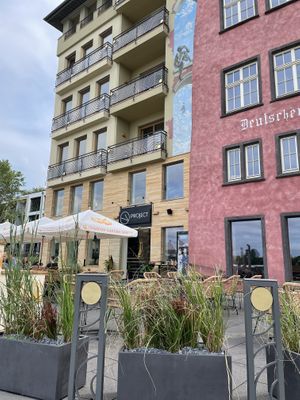 Front with outdoor seats  at Project Vegan in Koblenz