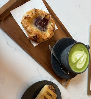 Cherry danish, vegan sausage roll and Matcha  at WYLDE in Galway