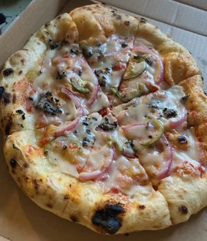 Photos don’t do it justice! Literally the tastiest dough ever  at Slicely Pizza in Keaau