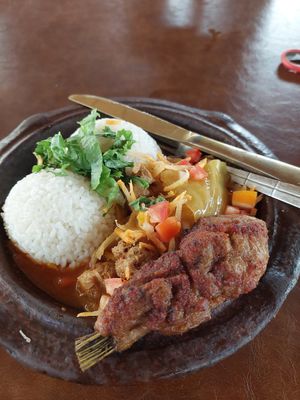 Riz (2.000 F) + Poulet (500 F) at Vegan Suma in Porto-novo