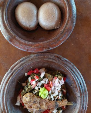 Pâte noire (télibô) + Légume (tchayo) (2.000 F) and Poulet (500 F) at Vegan Suma in Porto-novo