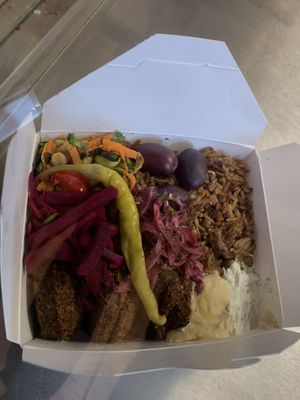 Falafel box with humus, mussaka… and different vegetables and sauces  at ELA  in Chamonix-mont-blanc