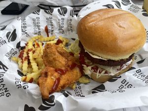Veggie burger served with fries and onion rings  at BigBang Burger in Antalya