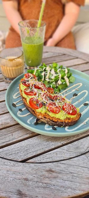 Green smoothie, flat white and avocado sandwich   at Vegan Vibes in Berlin