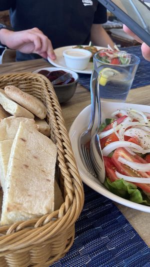 Pitta, tomato and white onion salad  at Symposium in Limassol