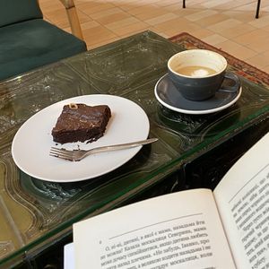 Vegan brownie and almond milk cappuccino   at Tovarystvo - Товариство in Lviv