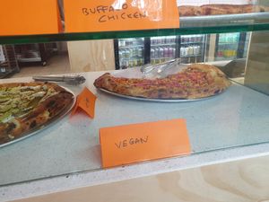 Pizza from the cabinet sold by the slice at Tony's Pizza in Palmerston North