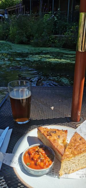 Local beer with warm Focaccia and tomato sauce at Egypt Mill Hotel & Restaurant in Gloucester