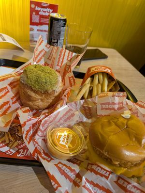 burger, fries and pistacho roll at Thunder Vegan - La Latina  in Madrid