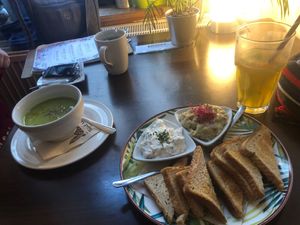 Vegan dips platter with whole grain toast at Vasmacska KávéZoo in Budapest