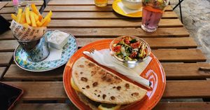 Vegan "tuna" panini with fries and salad at Vasmacska KávéZoo in Budapest