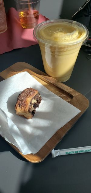 Nina Simone Smoothie: Mango, Key lime, Agave, Banana, Coconut 🥥 Mylk. at Plants & Poets Cafe in Newark