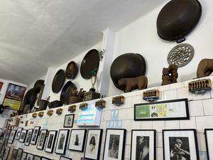 Photos of famous people along the wall  at Bar do Mineiro in Rio De Janeiro