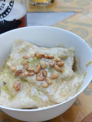 Ravioli ripieni di crema di fave at Carina - Sfoglia Rina Pasta Bar in Casalecchio Di Reno