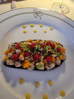 Grilled aubergine, chickpea hummus, carrot cream, toasted cashews,                                                              chia seeds, lime gel, currants and sprouts at Ristorante dei Poeti in Sirmione