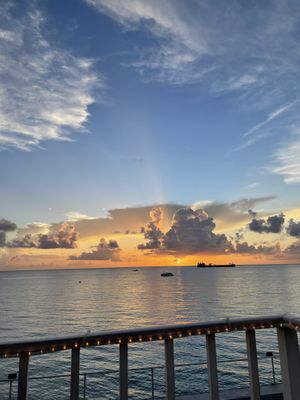 Beautiful harbor views  and sunsets  at Le Vele Waterfront Dining in George Town