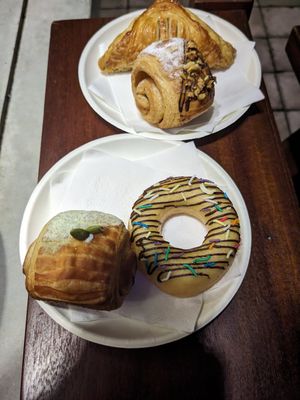 From top to bottom, samosa, pain au Chocolat, donut, matcha danish at O Plant-based - Nguyễn Đình Chiểu in Ho Chi Minh City