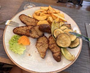 We stopped here for lunch and we all enjoyed it very much. Choice of seitan with potato, veggie burger and more. Large portions and prices commensurate with that. May recommend.  at Pirates Kitchen  in Omis