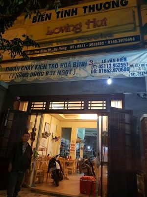 loving hut store front with owner at Loving Hut - Bien Tinh Thuong in Da Nang