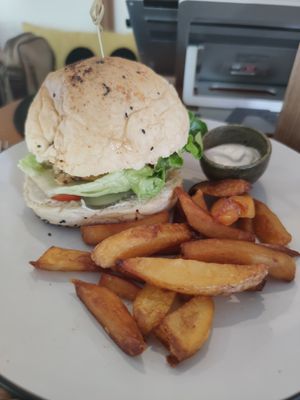 Vegan Burger with fries at Grasshopper Cafe in Luang Prabang