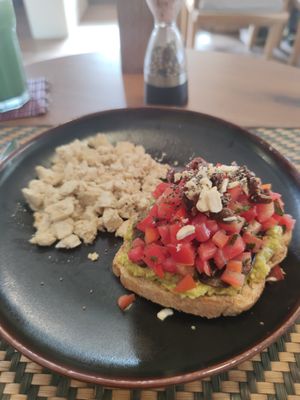 Scrambled tofu with guacamole/eggplant/tomato toast at Grasshopper Cafe in Luang Prabang
