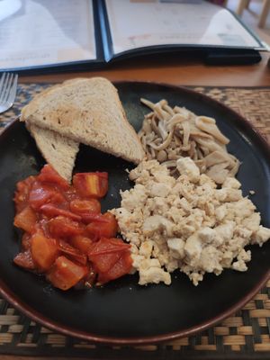 Scrambled tofu with mushrooms and tomato at Grasshopper Cafe in Luang Prabang