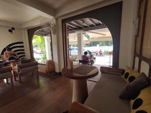Indoor and outdoor space at Grasshopper Cafe in Luang Prabang