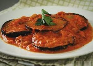 Berenjena en criolla $15000 COP. at Nutri Vegan in Buga