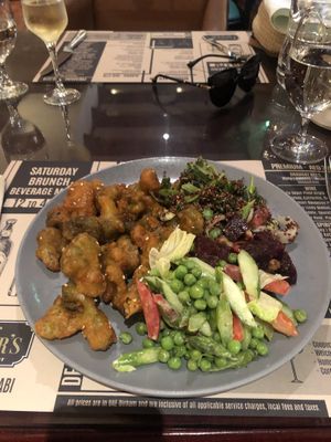 Buffalo broccoli (incredible) with salad  at Cooper's Bar and Restaurant in Abu Dhabi