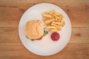 Veggie burger with fries  at African Vibrations Hostel Osu in Accra
