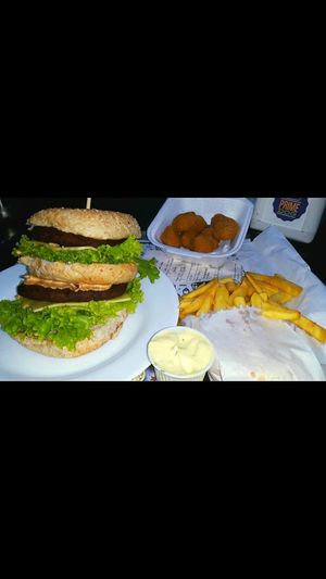 Huge burger and yummy appetizers at Prime Dog - Vila Mariana in Sao Paulo