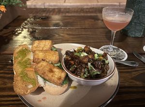 Banh Mi on left, BBQ Brussel Sprouts & Cosmo on right   at Forgotten Tonic in St Augustine