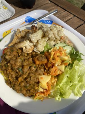 lentil stew and rice, potato salad, roasted cauliflower and multiple different salads  at Restaurant Seili in Nagu