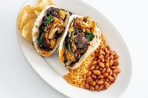 Roasted Cauliflower & Mushroom 
Taco Plate Two Roasted Cauliflower and Mushroom tacos with organic rice & beans. at Sharky's Woodfired Mexican Grill in Palmdale