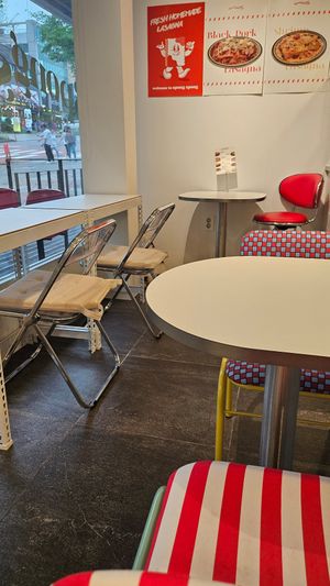 Some tables are available. Your food will be served in a take-away box with glasses of water, pickles and silverwares. at Spong Spong in Seogwipo