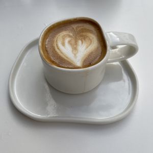 Oatmilk Flat White  at The Capsule Cafe in Ericeira