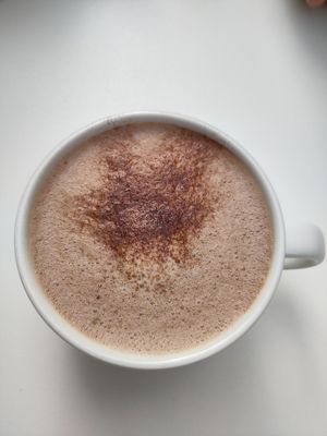 Hot chocolate with oat milk at The Capsule Cafe in Ericeira