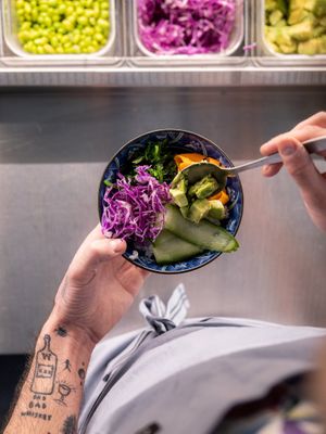 Fresh vegetables on each poke bowl at Noa Poke Koukaki in Athens