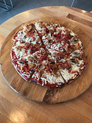 Tomato sauce, vegan cheese, beyond meat, sun dried tomatoes, and mushrooms superrrrr good 😋 at Avatara Pizza in Calgary