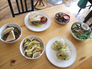 assortment of our cafe menu items! Our menu changes every few months, but we have the favorites that never leave like our Biscuits & Gravy as well as our Breakfast Sandwich! at Cleveland Vegan in Lakewood