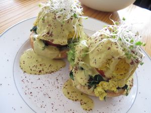 Swiss Chard Benedict - cashew hollandaise, homemade English muffin, avocado, tomato, sprouts at Cleveland Vegan in Lakewood