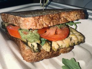 Pesto tempeh sandwich on gluten free bread. Super tasty!  at Cleveland Vegan in Lakewood