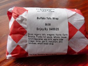 Buffalo Tofu Wrap package. One of my favorite items that is often in the refrigerated To Go case. Even though onions are listed first, the tofu dominates and any onions are unobtrusive. at Cleveland Vegan in Lakewood