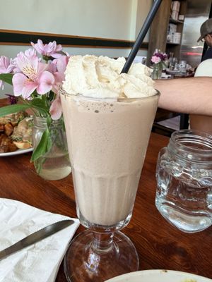 Peanut butter/Cookie n’ Cream mix milkshake with vegan whipped cream   at Cleveland Vegan in Lakewood