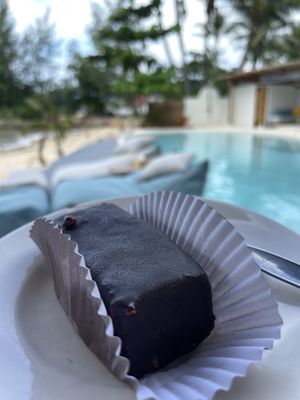 Snickers and new pool in background (entrance fee though )  at Orion Cafe in Koh Phangan
