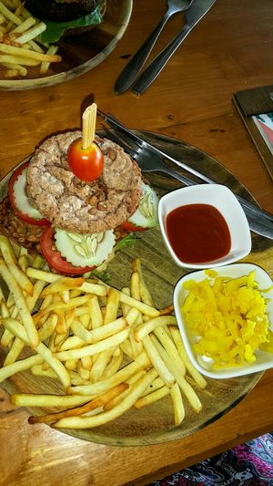 Soma-shroom burger with air-fried fries at Orion Cafe in Koh Phangan