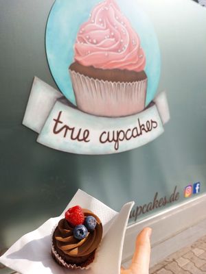 Logo at store front and double choc cupcake at true cupcakes in Mannheim